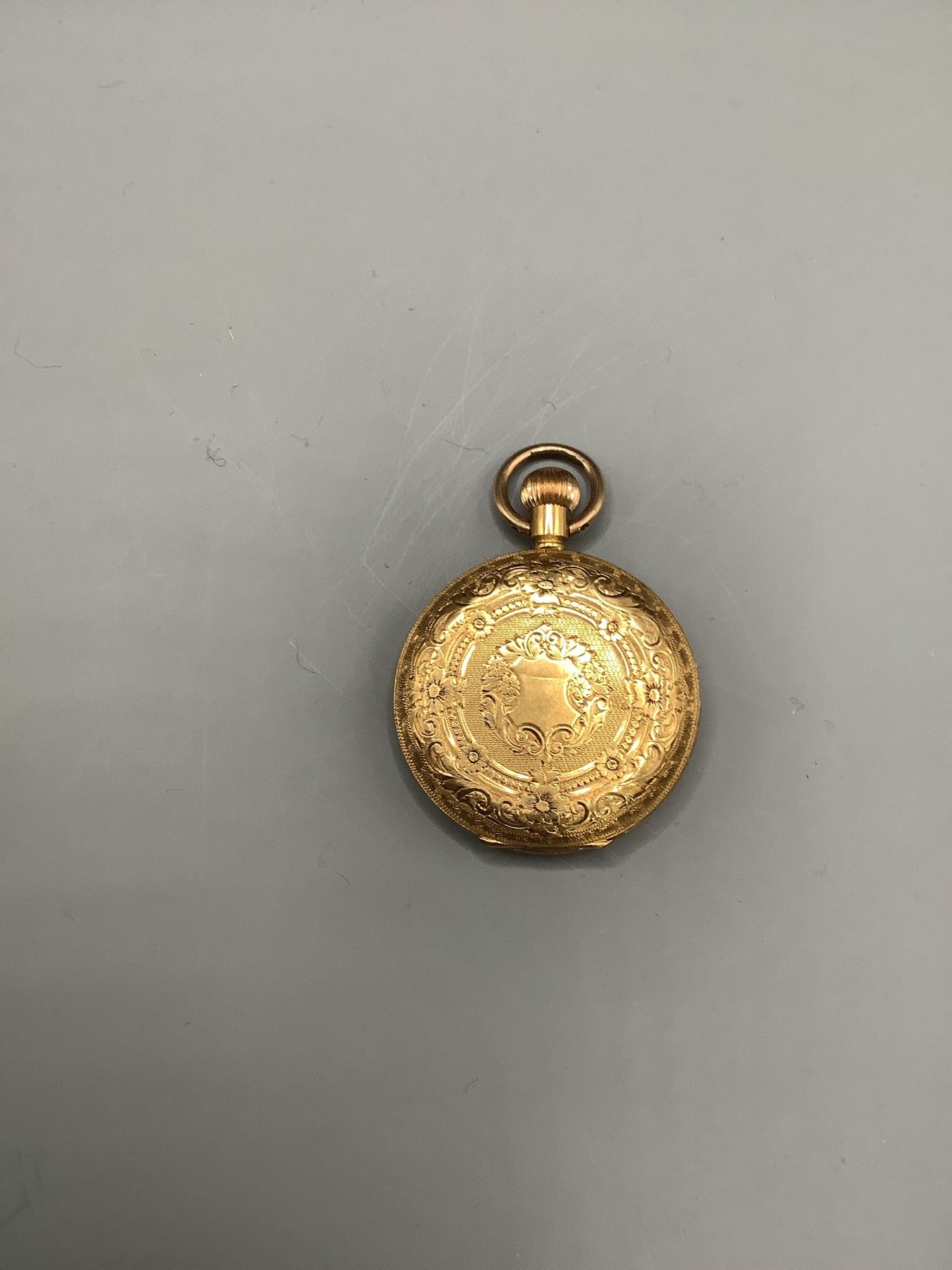 An early 20th century engraved 18k Waltham hunter fob watch, case diameter 34mm, gross weight, 34.9 grams.